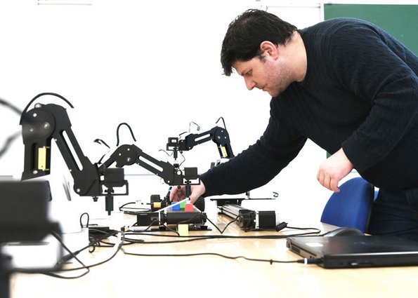 Associate professor Michail Beliatis configures a robot 